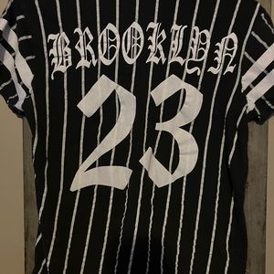 On Fire 🔥 Jersey/Shirt. Outgrown it gently used freshly washed as well.